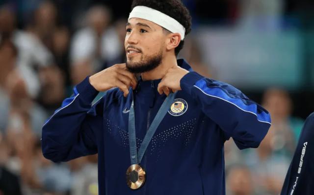 火狐电竞官方网站-奥运经历促成蜕变？加内特：布克新赛季将大爆发